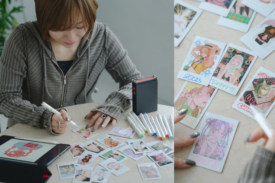 イラストレーター・NAKAKI PANTZさんが自身のイラストをプリントし、デコレーションしている様子